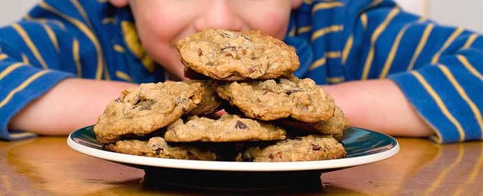 kid with cookies