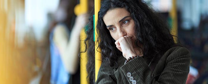 women with anxiety on train