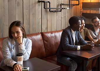 woman left out from her coworkers