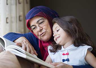 muslim grandmother reading